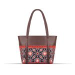 AJRAK – A culturally inspired art design shoulder bag showcasing traditional patterns and elegant craftsmanship.