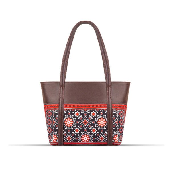 AJRAK – A culturally inspired art design shoulder bag showcasing traditional patterns and elegant craftsmanship.