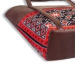 AJRAK – A culturally inspired art design shoulder bag showcasing traditional patterns and elegant craftsmanship.