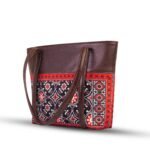 AJRAK – A culturally inspired art design shoulder bag showcasing traditional patterns and elegant craftsmanship.