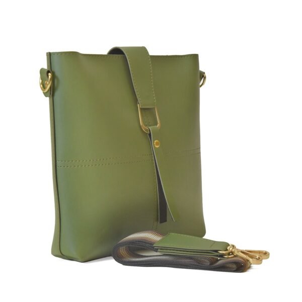 A green leather cross bag with a structured silhouette, gold-tone buckle, and an adjustable strap for versatile wear.