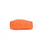 Vibrant orange quilted hand bag with secure closure