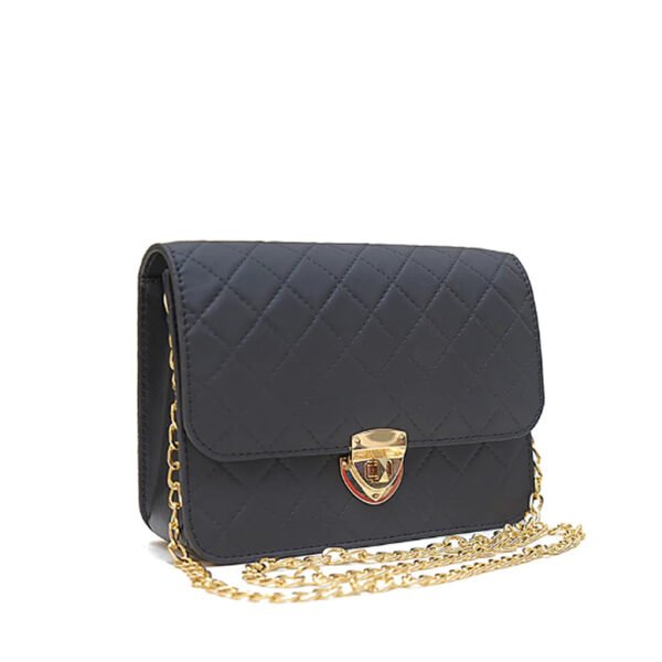 Black NORA cross body bag with golden chain and quilted design.