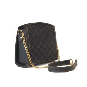 Stylish black cross body bag with gold chain and luxurious suede front panel, ideal for a sophisticated look.