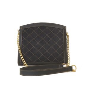 Stylish black cross body bag with gold chain and luxurious suede front panel, ideal for a sophisticated look.