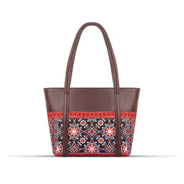 AJRAK ART Shoulder Bag featuring a traditional design and long leather straps, handcrafted in Pakistan.