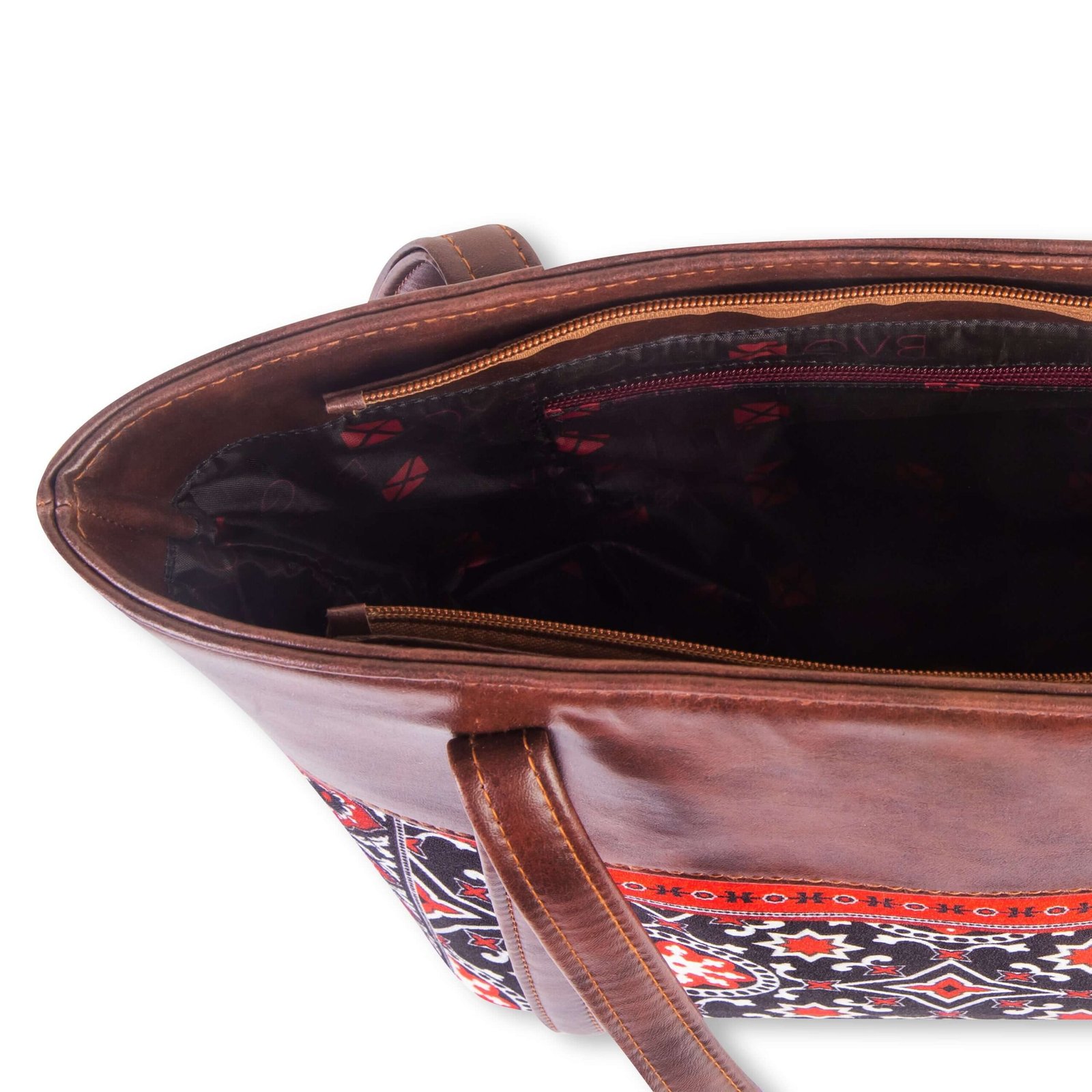 AJRAK ART Shoulder Bag featuring a traditional design and long leather straps, handcrafted in Pakistan.