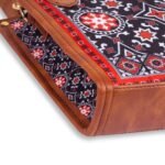 Discover the Ajrak Scarlet Handbag, featuring a traditional Sindhi heritage design. Shop premium handbags online in Pakistan today!