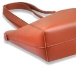 Amber 3-piece tote bag set, including 2 small pouches, available in elegant black and brown colors in Pakistan.