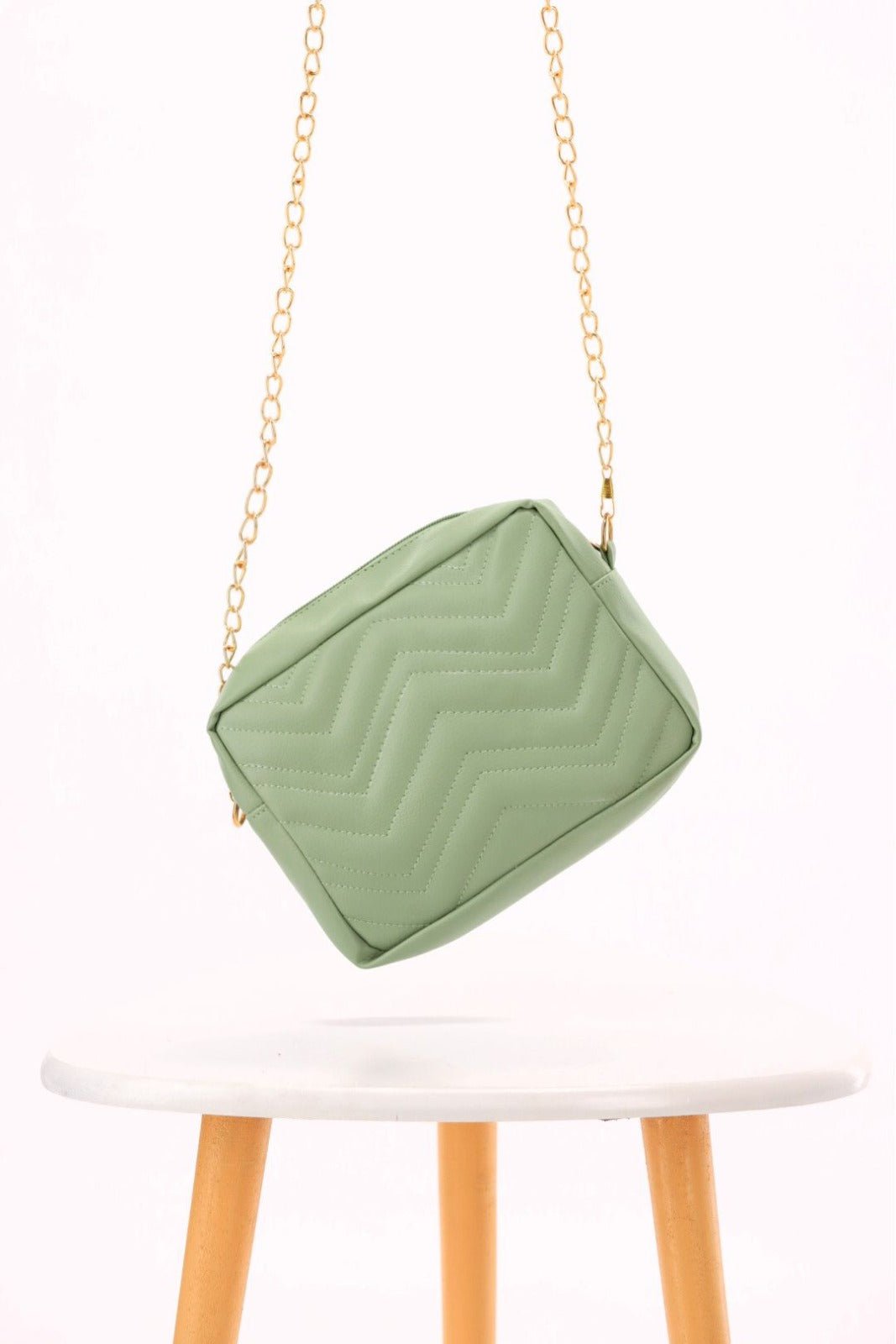 Aura Green bag with golden chain for women in pakistan