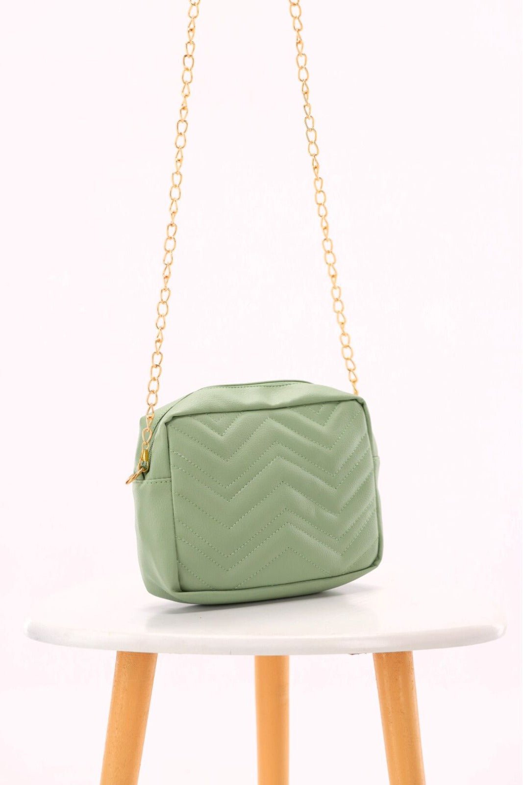 Aura Green bag with golden chain for women in pakistan