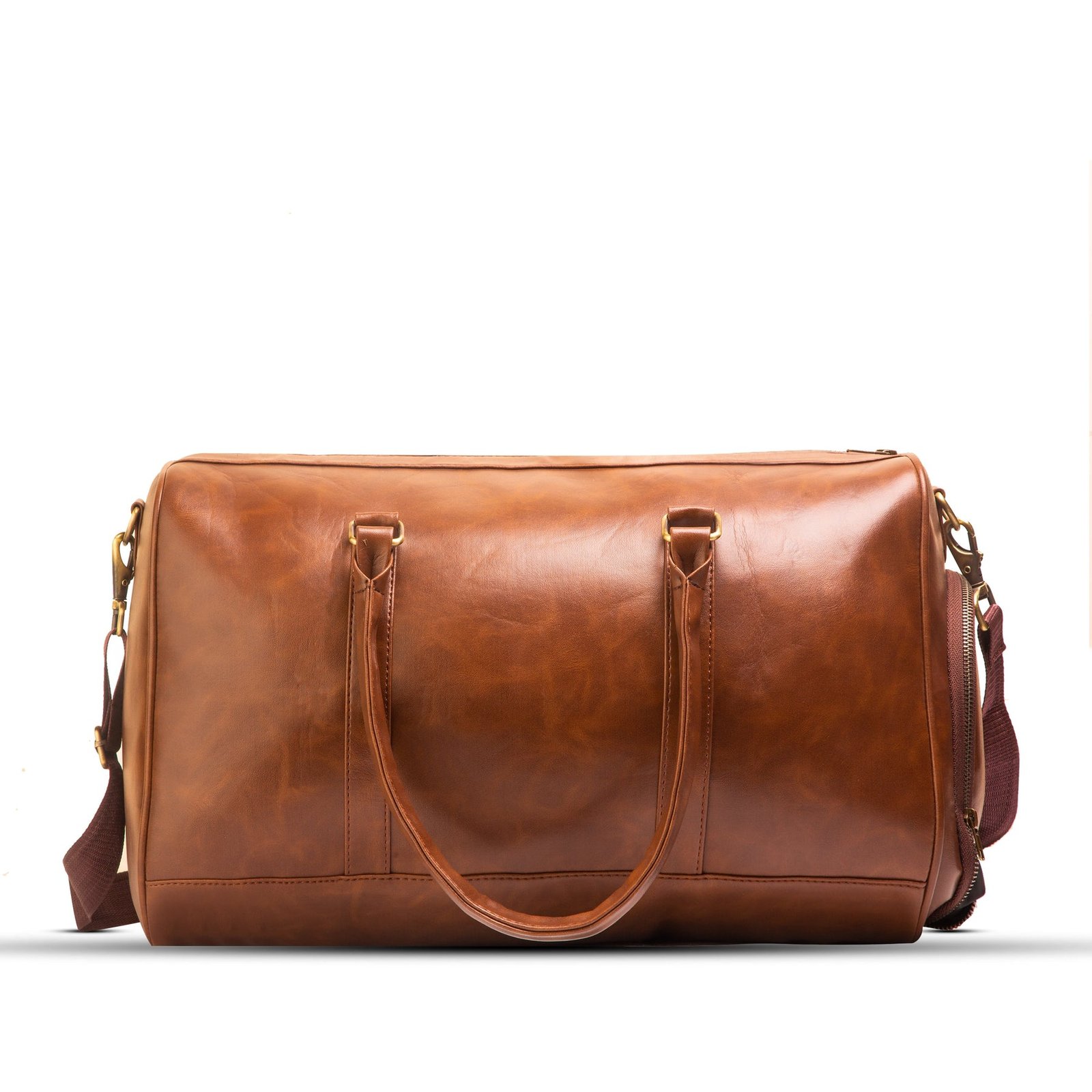 A BERLIN Duffel Bag with a large capacity, premium leather design, sturdy handles, and an adjustable strap for convenient travel in Pakistan.