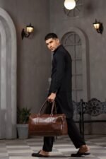 A BERLIN Duffel Bag with a large capacity, premium leather design, sturdy handles, and an adjustable strap for convenient travel in Pakistan.