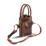 Bliss Phone Mini Pouch: Designed for convenienat mobile carrying during travel, crafted from premium leather with a long strap in a chic cocoa color. Available in Pakistan.