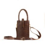 Bliss Phone Mini Pouch: Designed for convenienat mobile carrying during travel, crafted from premium leather with a long strap in a chic cocoa color. Available in Pakistan.