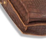 Bliss Phone Mini Pouch: Designed for convenienat mobile carrying during travel, crafted from premium leather with a long strap in a chic cocoa color. Available in Pakistan.