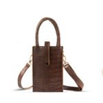 Bliss Phone Mini Pouch: Designed for convenienat mobile carrying during travel, crafted from premium leather with a long strap in a chic cocoa color. Available in Pakistan.