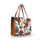 CAMELLIA Tote Bag, featuring a nature-inspired design on a clean white base, available at our store in Pakistan.