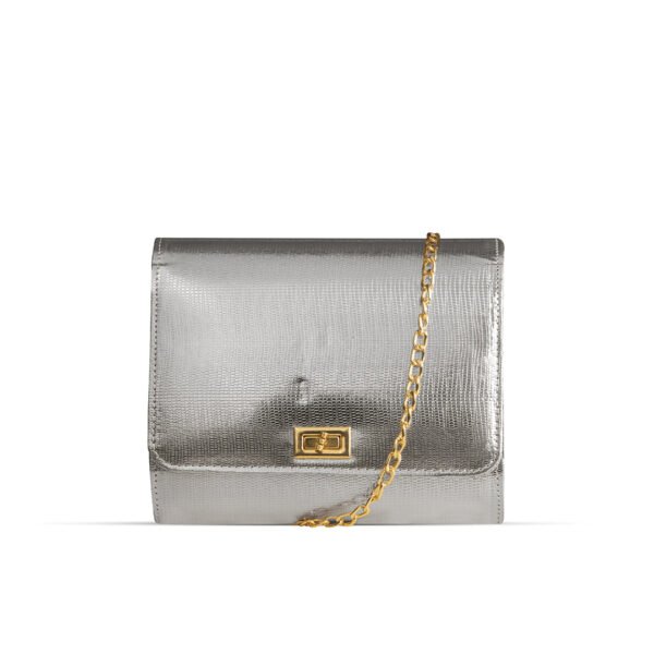 A luxurious hand bag in sleek silver color, with adjustable golden chain, available in Pakistan.