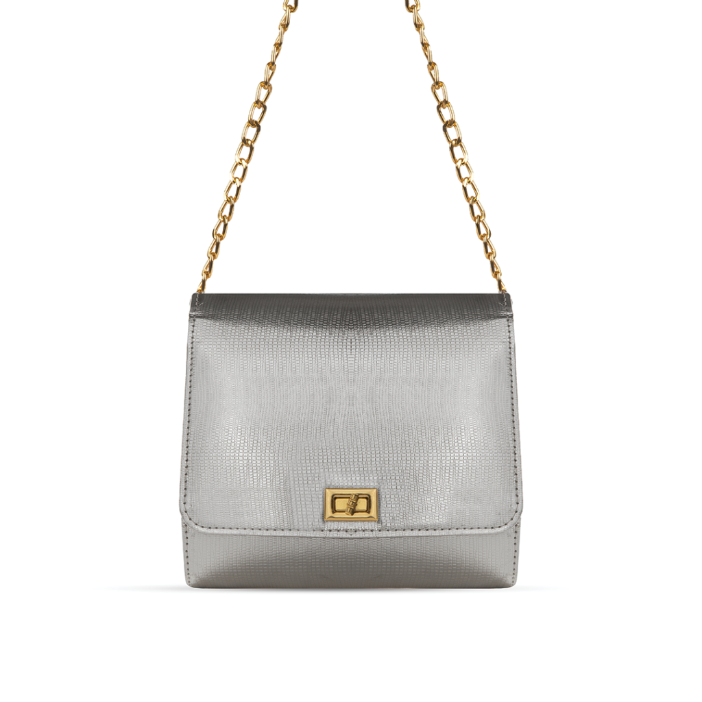 A luxurious hand bag in sleek silver color, with adjustable golden chain, available in Pakistan.