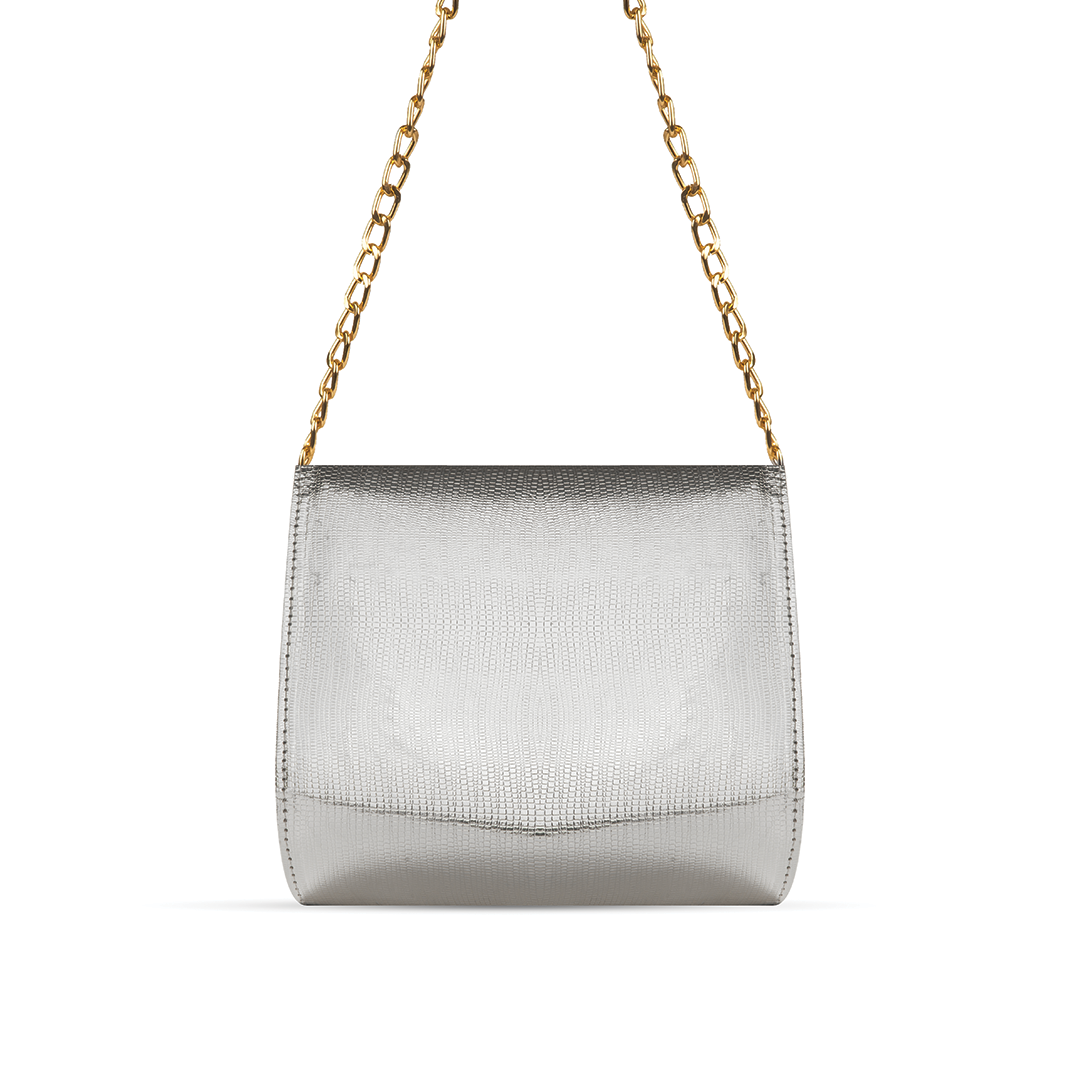 A luxurious hand bag in sleek silver color, with adjustable golden chain, available in Pakistan.