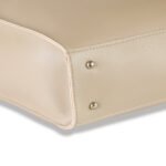 A stylish shoulder bag with a spacious Beige Color, adjustable strap, and sleek design in pakistan