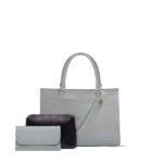 Daisy 3-Piece Handbag Set: Includes a stylish pink handbag with an adjustable strap, a sleek grey handbag, and a charming grey and black pouch. Now available in Pakistan.