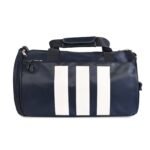 A Duffel Bag with a multi-use design, featuring a spacious interior, durable build, sturdy handles, and an adjustable strap for travel and daily use.
