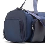 HQ Duffel Bags featuring a fresh, creative design with multiple pockets, available in a stylish blue color and equipped with an adjustable strap. Now available in Pakistan.