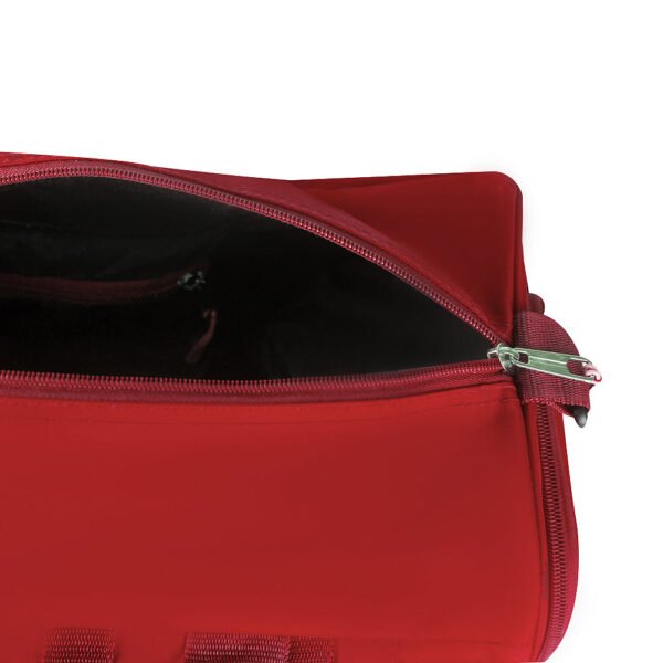 The HQ RED Duffel Bag in a stylish red design, featuring a spacious interior, sturdy build, and adjustable strap for comfortable carrying.