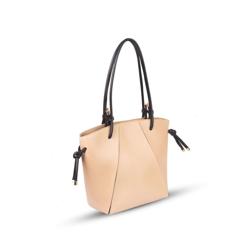 The Kate Tote Bags feature an elegant design, available with a sleek black leather strap or in a sophisticated beige color, now in Pakistan.