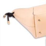 The Kate Tote Bags feature an elegant design, available with a sleek black leather strap or in a sophisticated beige color, now in Pakistan.