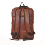 A choco brown LAPTOP BACKPACK with padded straps, multiple compartments, and a sleek design for professionals and students in Pakistan.