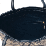 Lotus shoulder bag, elegantly designed with a nature-inspired motif, crafted from premium materials in Pakistan.