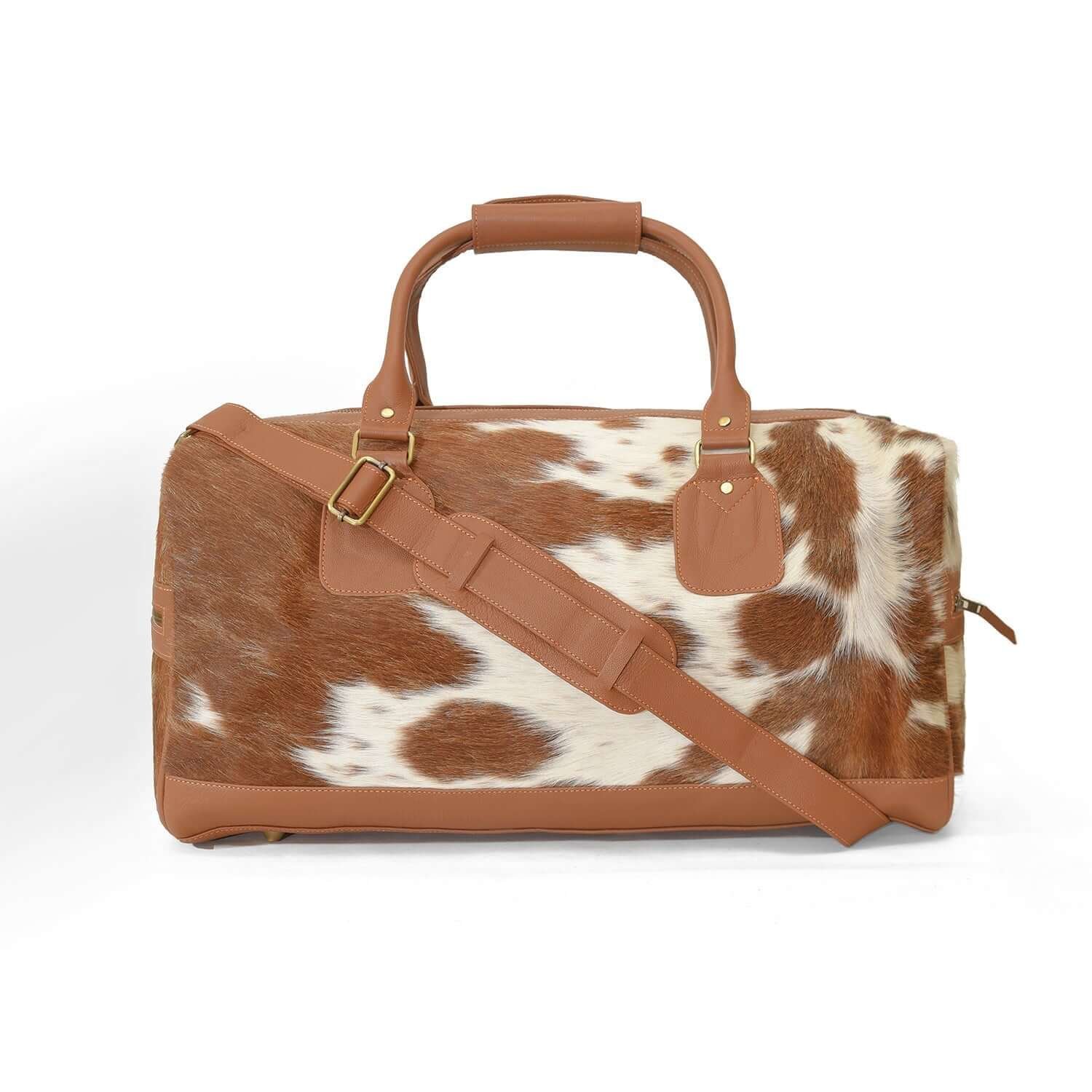 Moxi brown leather bag, featuring a cow-inspired design, now available in Pakistan.