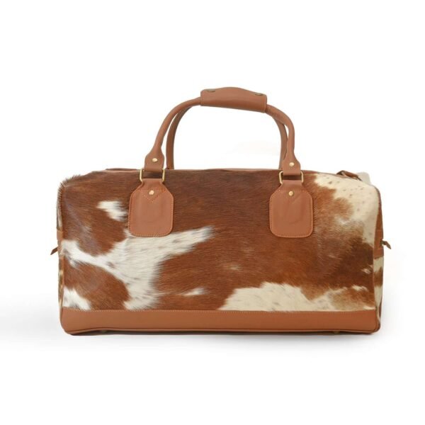 Moxi brown leather bag, featuring a cow-inspired design, now available in Pakistan.