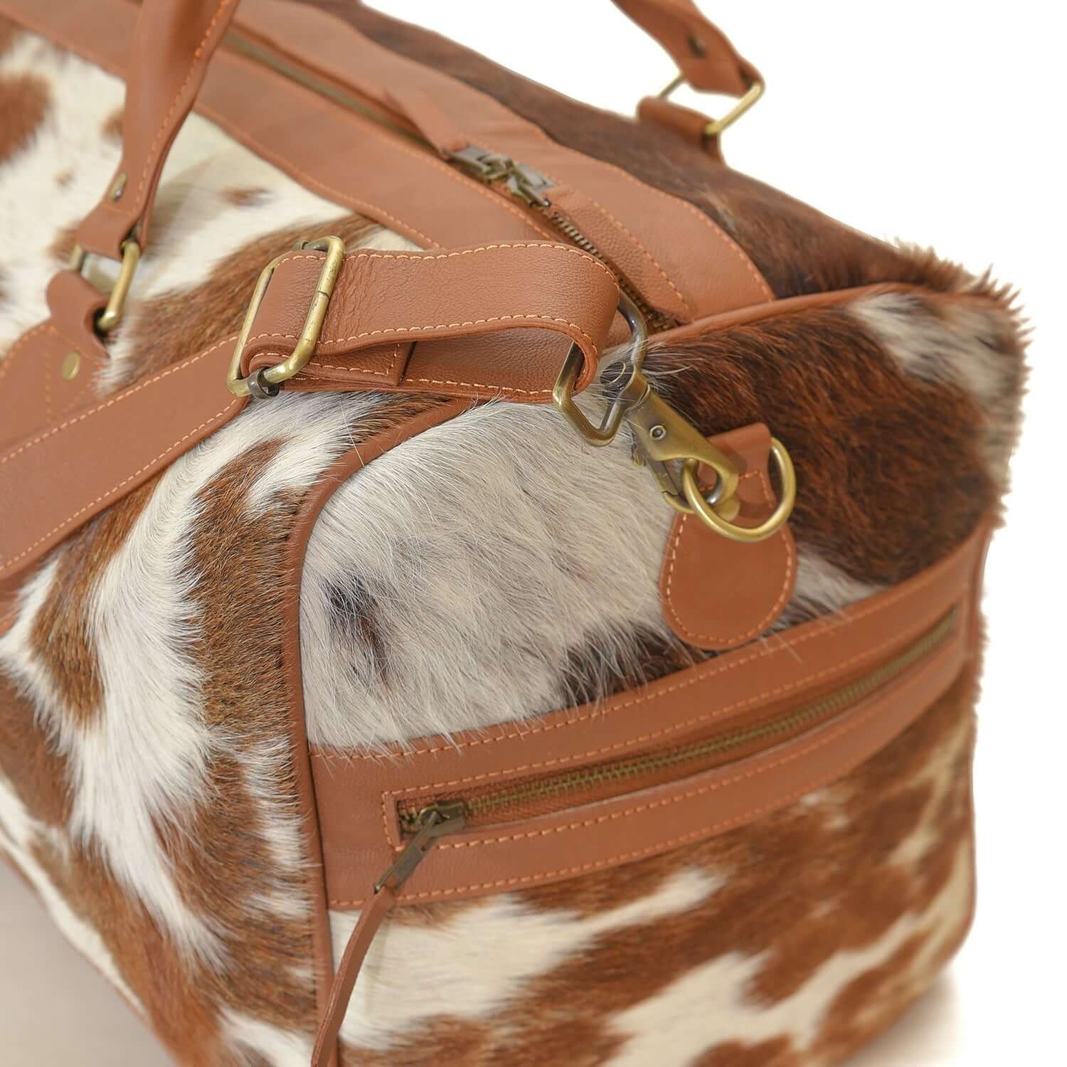 Moxi brown leather bag, featuring a cow-inspired design, now available in Pakistan.