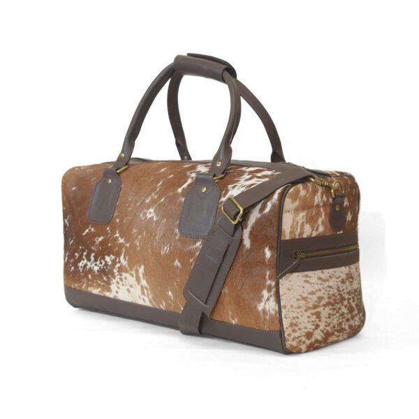 Moxi brown leather bag, featuring a cow-inspired design, now available in Pakistan.