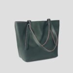 The Nova Tote Bags, available in elegant Green, come with two wallet pieces and are now offered in Pakistan.