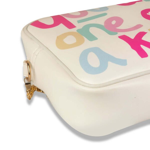 A typography crossbody bag with a gold chain in a white color is best for womens in pakistan