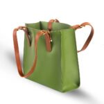 The Serene 3-Piece Tote Bag Set features a spacious design and elegant brown leather straps, now available in Pakistan.