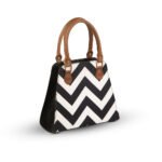 The Versatile Swift Handbag: A stylish and practical design in elegant white, crafted from premium micro-synthetic leather, now available in Pakistan.