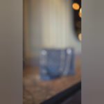 The Sydney Shoulder Bag, designed with premium synthetic leather and a silver-tone metal chain strap, is available in an elegant blue color in Pakistan.