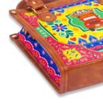 Celebrate Pakistan's vibrant culture with our Truck Art Handbag – a perfect blend of tradition and vibrant colors. Featuring a bold, colorful design paired with a contrasting brown leather handle, it’s a unique accessory that stands out beautifully.