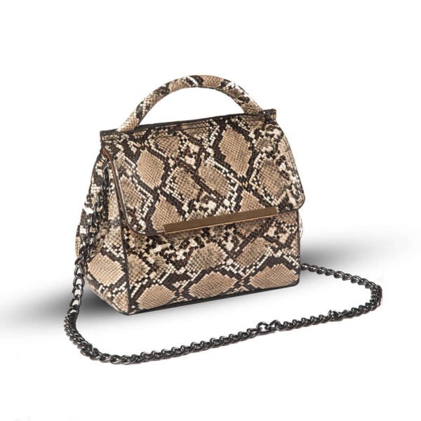 VENOM Shoulder bag premium snake skin material With Charming silver Chain crafted in an elegant brown and beige color combination. Now available in Pakistan.