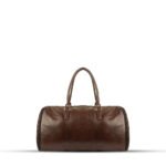 The WEEKENDER Duffel Bag, a premium leather travel bag with sturdy handles, a secure zipper, and a spacious design for versatile use.